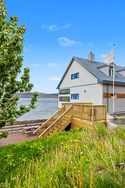 Hotel West building by the fjord in Patreksfjörður