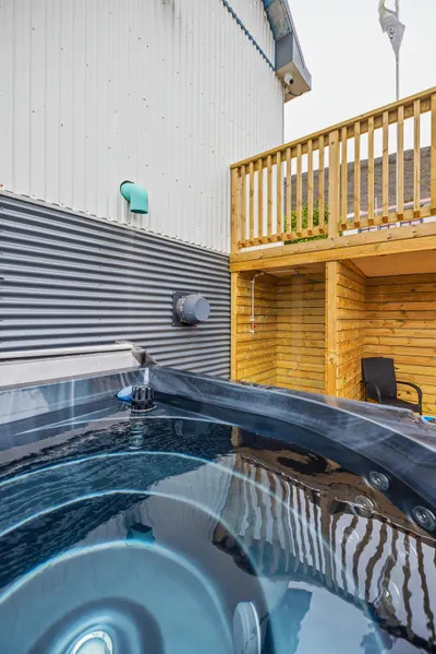 Outdoor hot tub on the deck at Hotel West